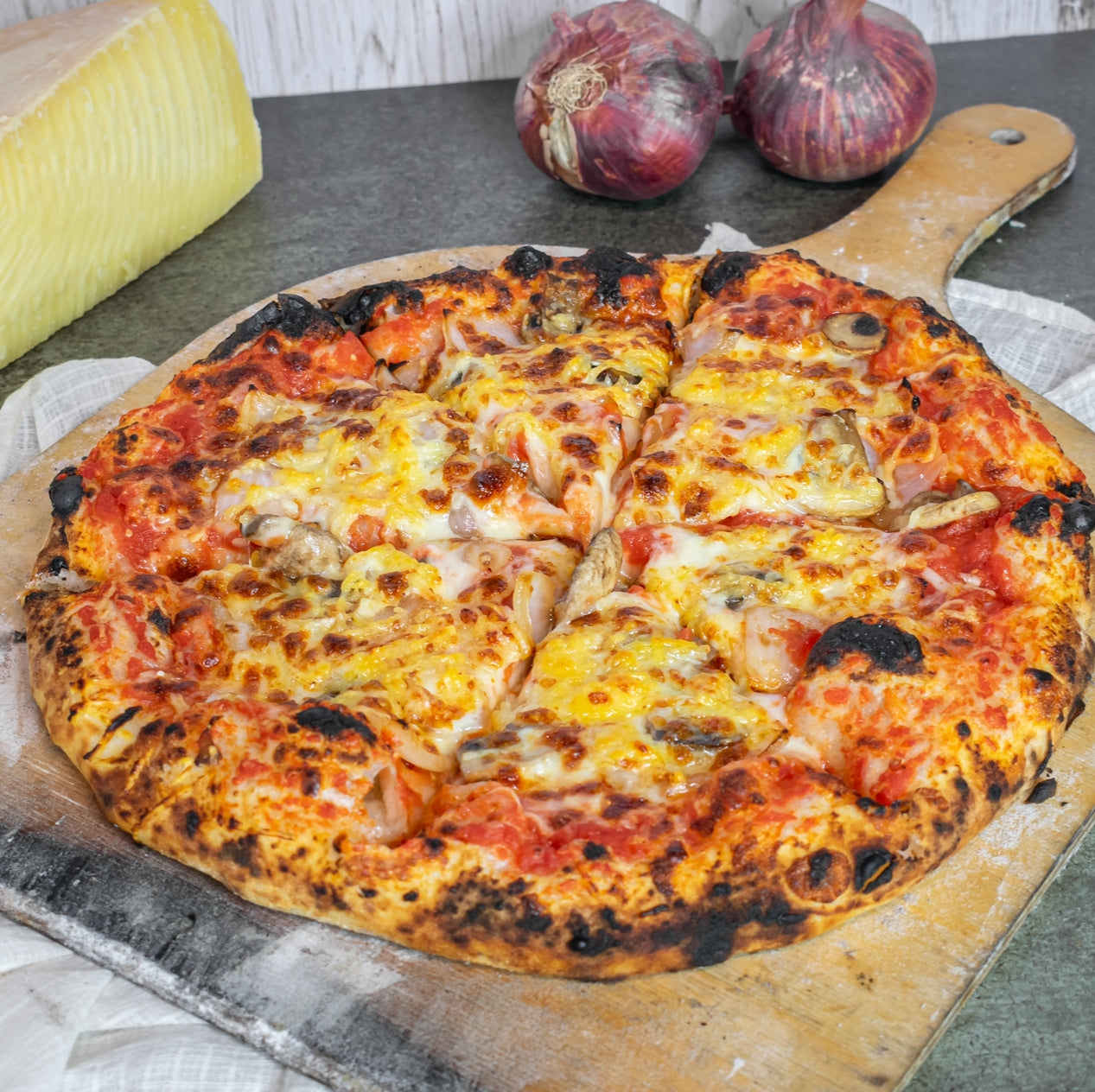 Gruyere cheese & caramelised onion pizza