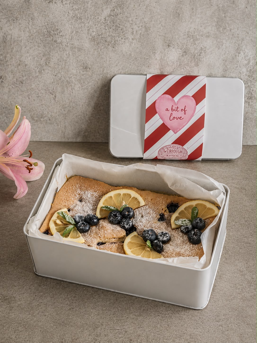 Lemon Blueberry Flourless Cake in Weirdough travel tin