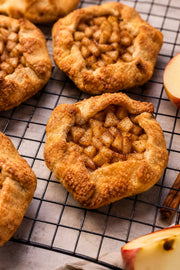 Eggless apple cinnamon sourdough galettes cooling on a wire rack
