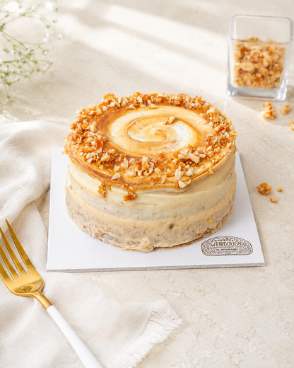 Brown butter caramel and hazelnut cake in bright natural light
