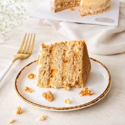 Slice of brown butter caramel and hazelnut cake