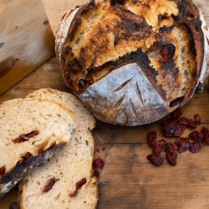 Cranberry and walnut sourdough loaf with sliced crumb
