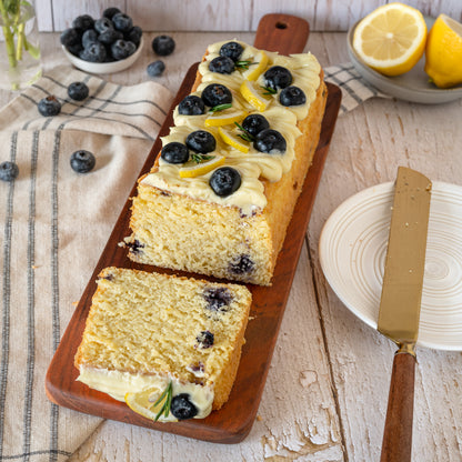 Lemon bluberry flourless tea cake with drizzle of cream cheese