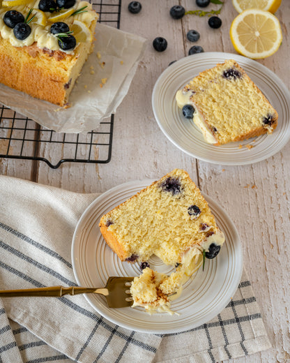 Lemon bluberry flourless tea cake with drizzle of cream cheese