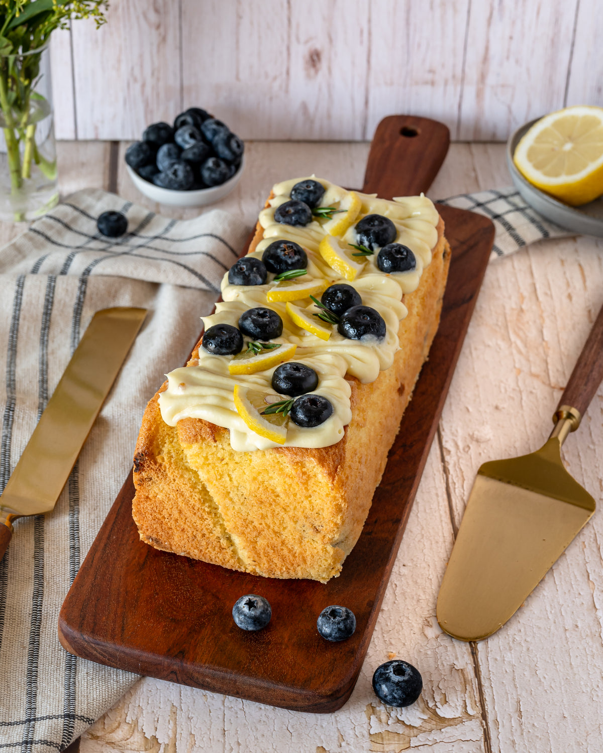 Lemon bluberry flourless tea cake with drizzle of cream cheese