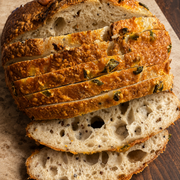 Quinoa sourdough topped with jalapeño cheddar