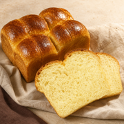 Sourdough brioche loaf with sliced crumb