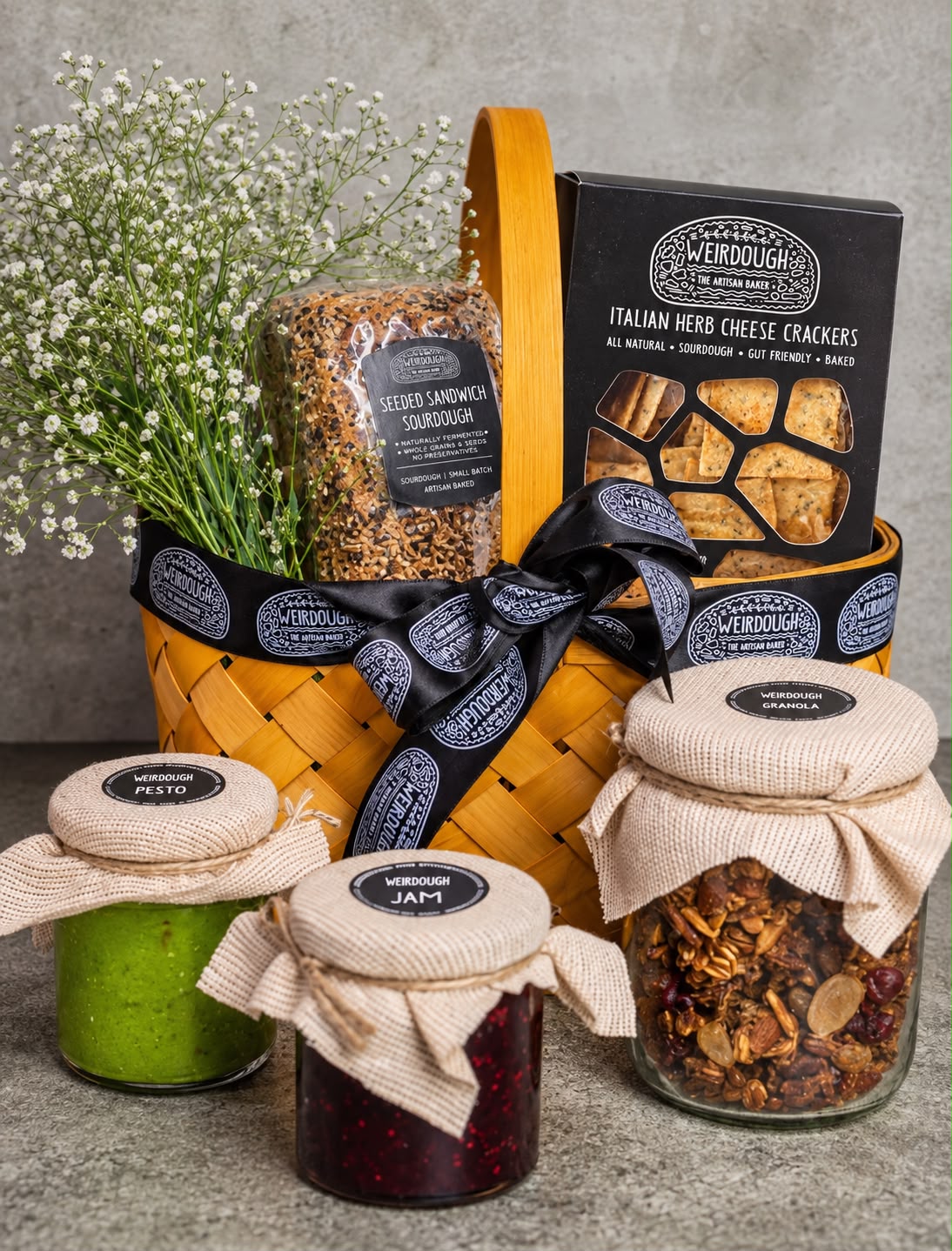Weirdough gift hamper with seeded sourdough, crackers, pesto, jam and granola